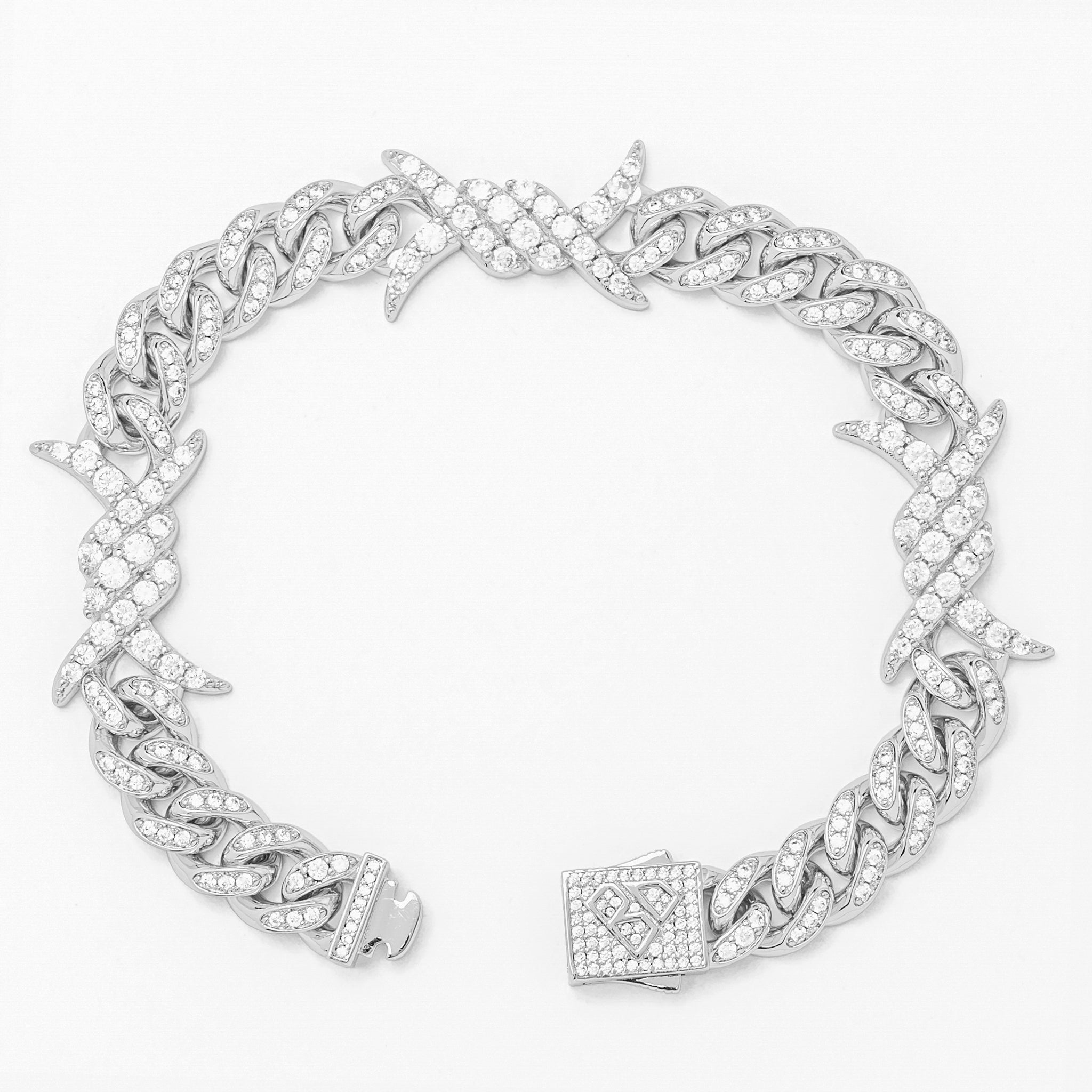 Side angle view of Big Daddy 10MM iced out silver bracelet showing spiked horn details and cubic zirconia stones