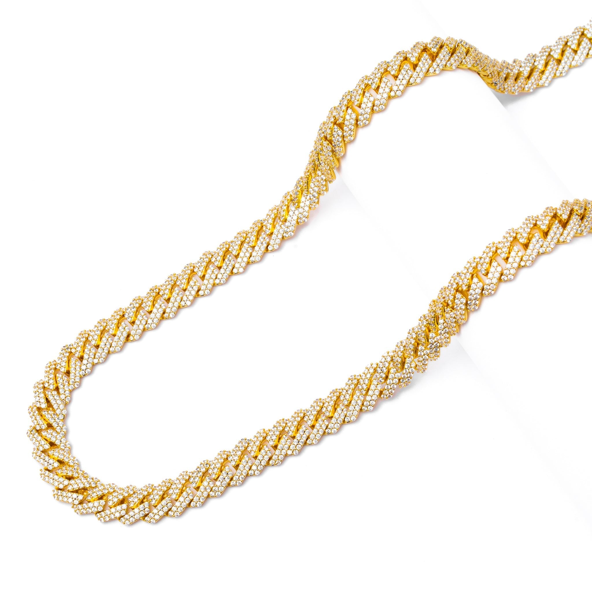Big Daddy 12MM Cuban chain coiled showing 3D diamond-encrusted texture