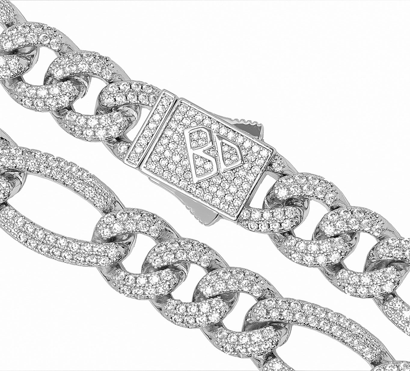 Close-up detail of figaro chain links with crystal pave and toggle clasp