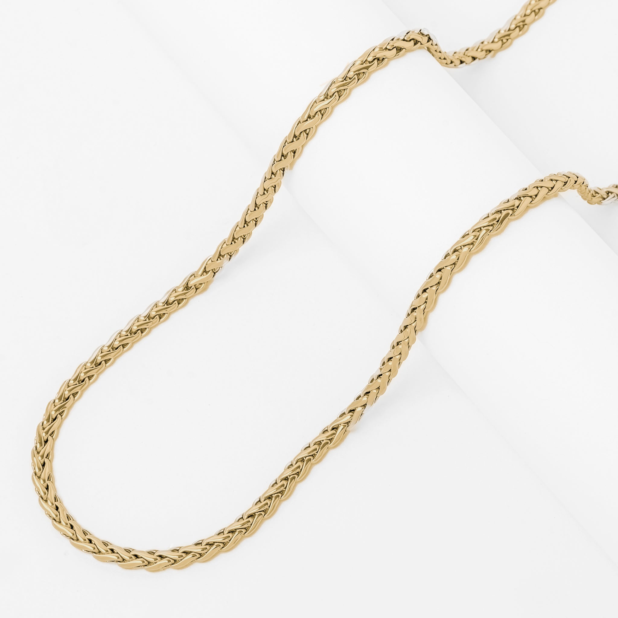 Two 5mm gold spiga rope chains displayed at angle