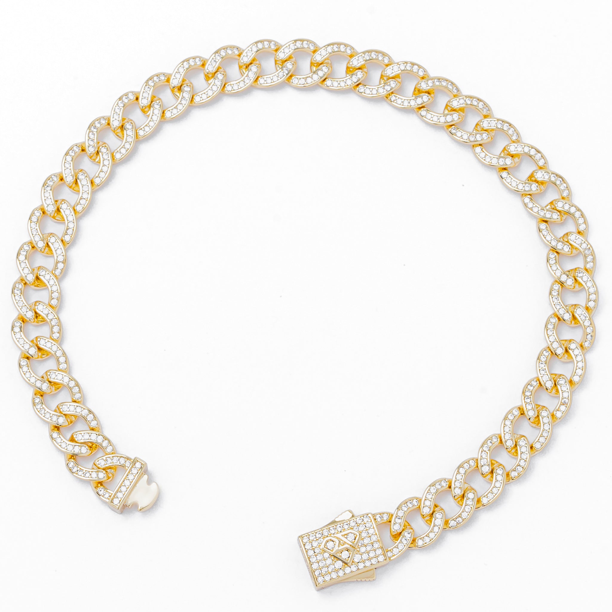 Side view of gold curb Cuban bracelet with pave diamond clasp