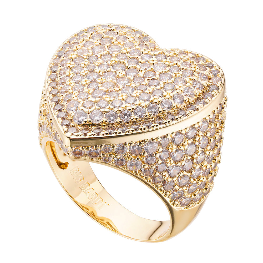 Gold heart iced out ring at angle showing hinged design and crystal details