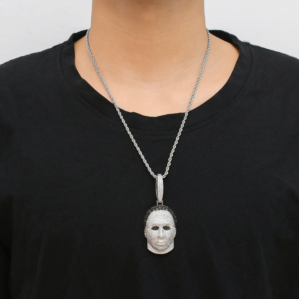 Iced Michael Myers pendant worn on silver chain against black shirt
