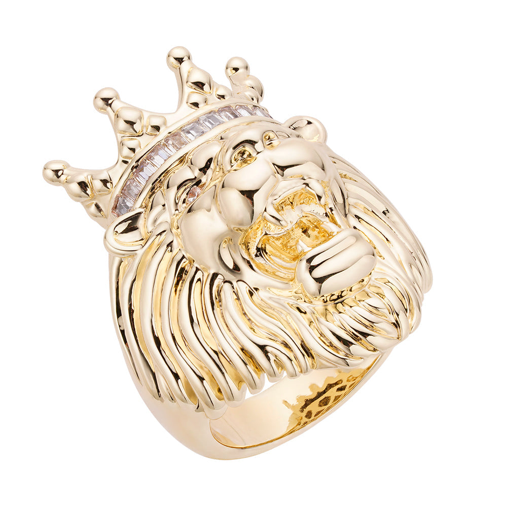Gold lion head ring with baguette-cut diamond crown and detailed mane