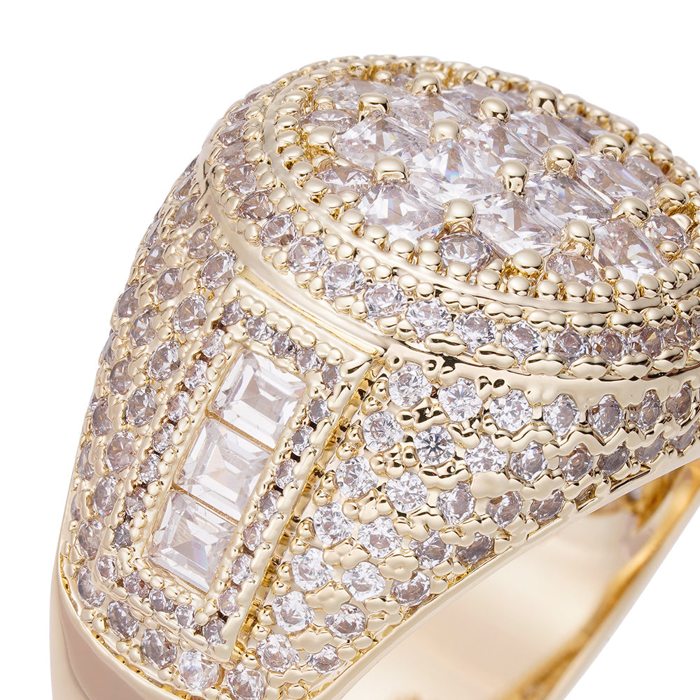 Close-up angled view of baguette cut cubic zirconia setting and gold band