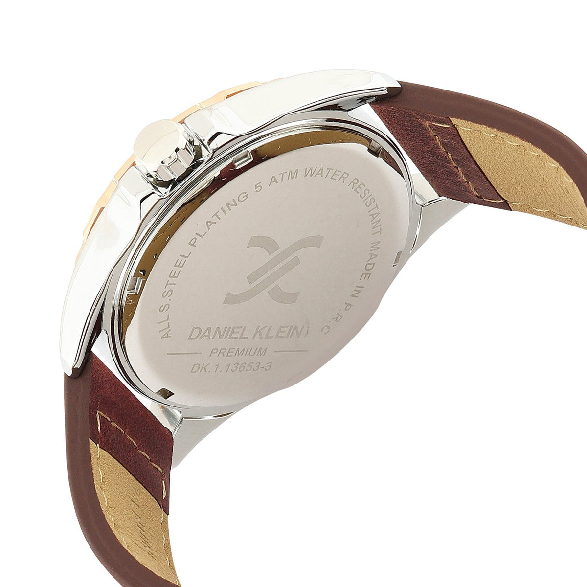 Caseback of Daniel Klein Premium watch with engraved details and brown leather strap
