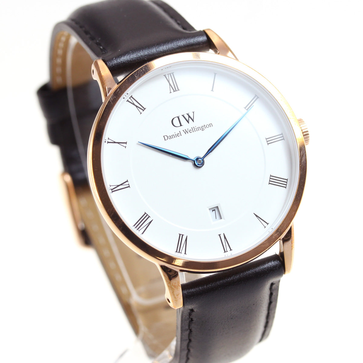 Three-quarter view of Daniel Wellington Dapper Sheffield with gold case, white dial, and black leather strap