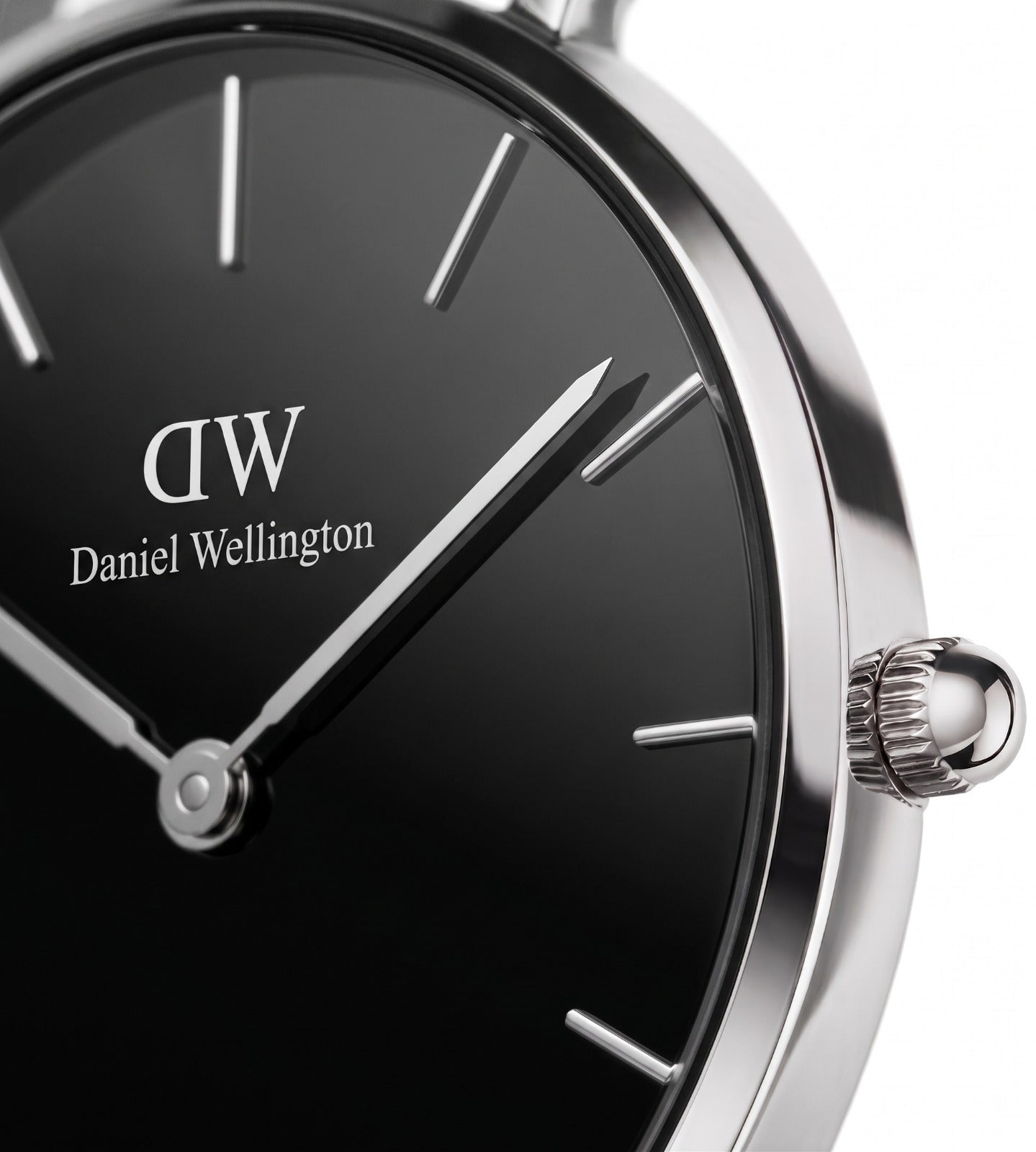 Daniel Wellington dial close-up showing silver hands and minimalist index markers