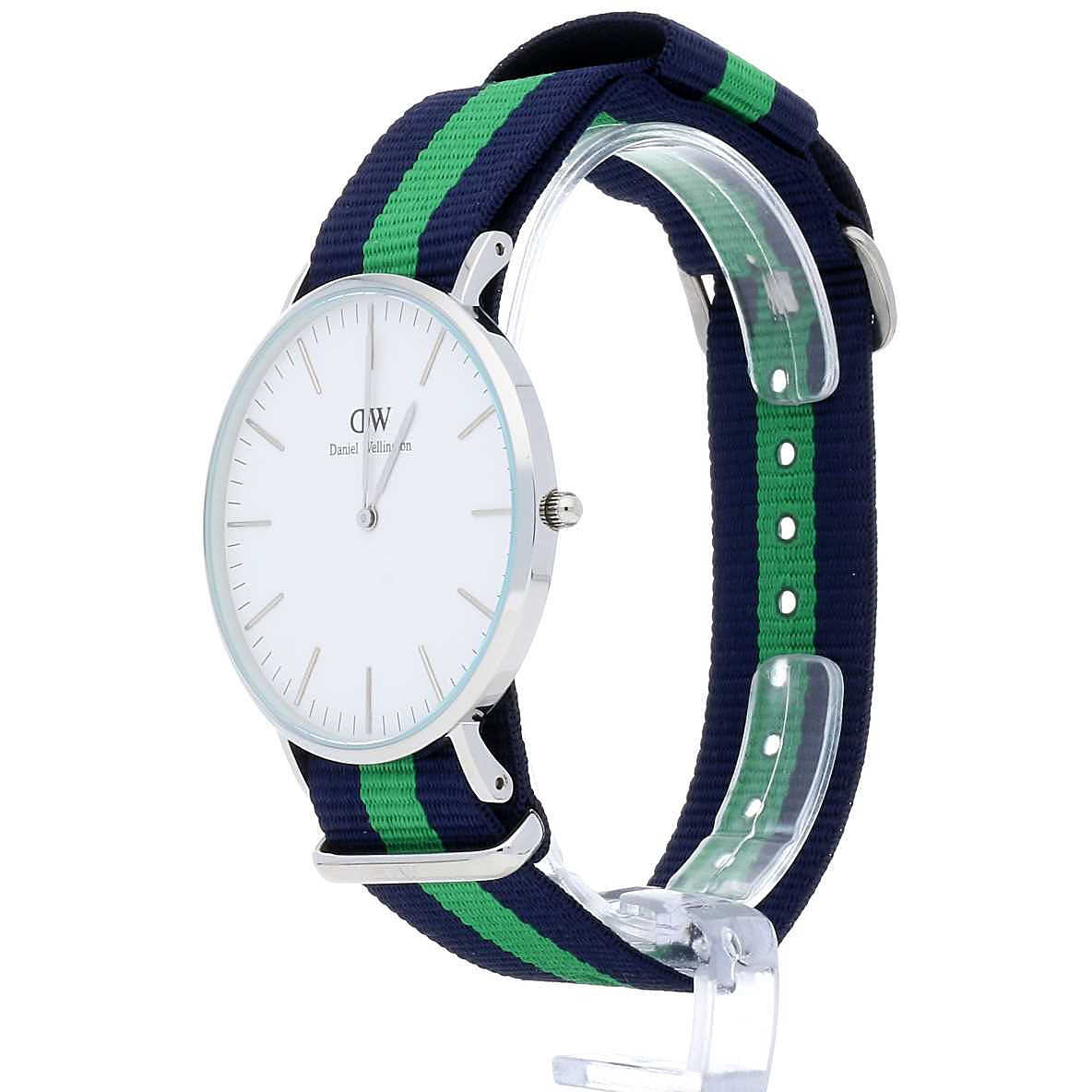 Side angle view of Warwick 40mm watch showing silver case, white dial, and navy green striped fabric strap