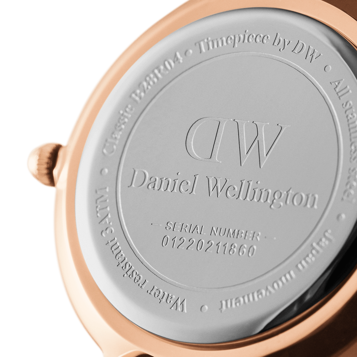 Daniel Wellington caseback showing engraved branding and serial number 04220211660