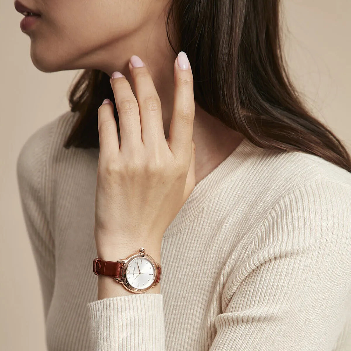 Emporio Armani Mia AR11525 watch on wrist showing rose gold case and brown strap