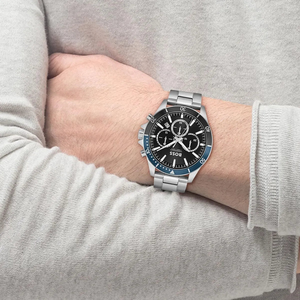 Hugo Boss Troper chronograph watch worn on wrist with black dial and blue bezel