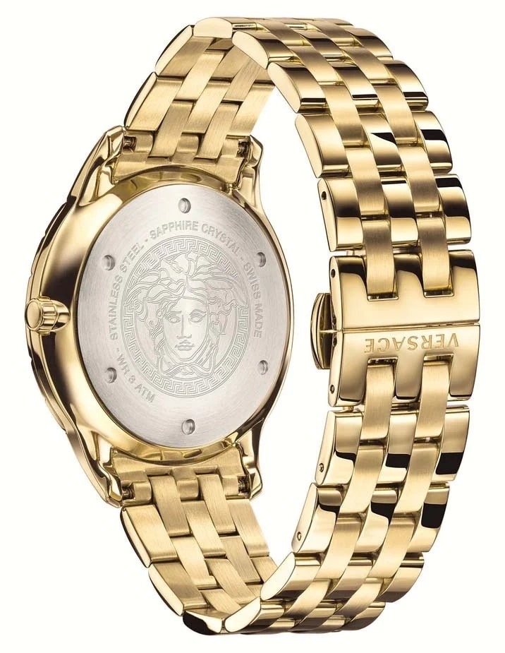 Gold-tone stainless steel Versace watch with a metal link bracelet and a silver-tone crystal back cover featuring the brand's Medusa head logo.