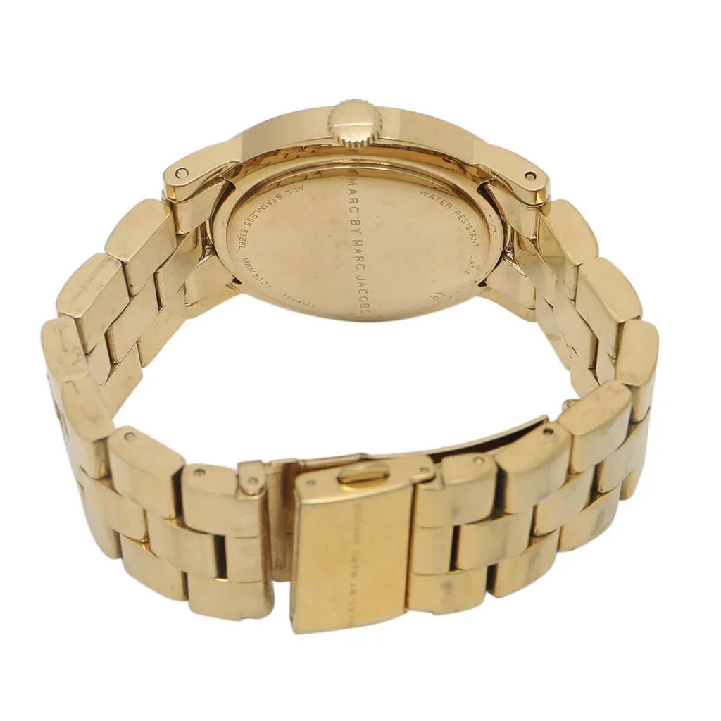 Gold-tone stainless steel bracelet and case back detail of Amy watch