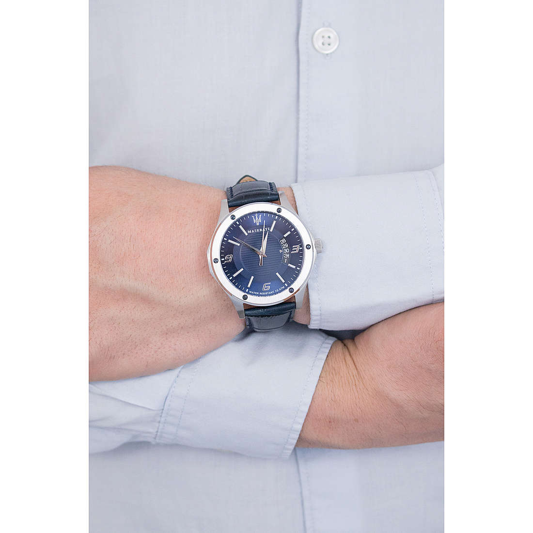 Maserati Circuito watch worn on wrist with blue dial and navy leather strap