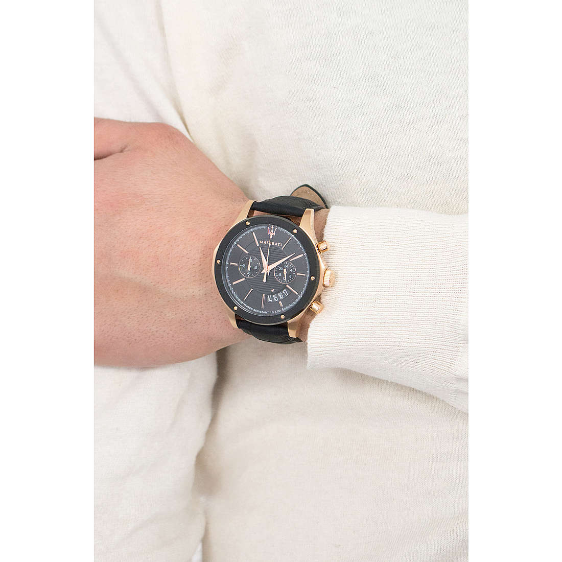 Maserati Circuito chronograph watch on wrist showing black dial, rose gold accents, and black leather band