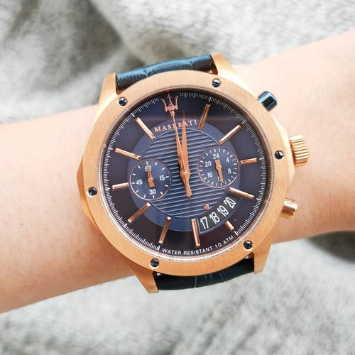 Maserati Circuito chronograph on wrist displaying blue dial and rose gold chronograph pushers