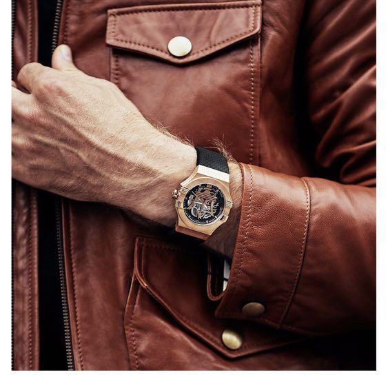 Maserati Potenza skeleton watch on wrist worn with brown leather jacket