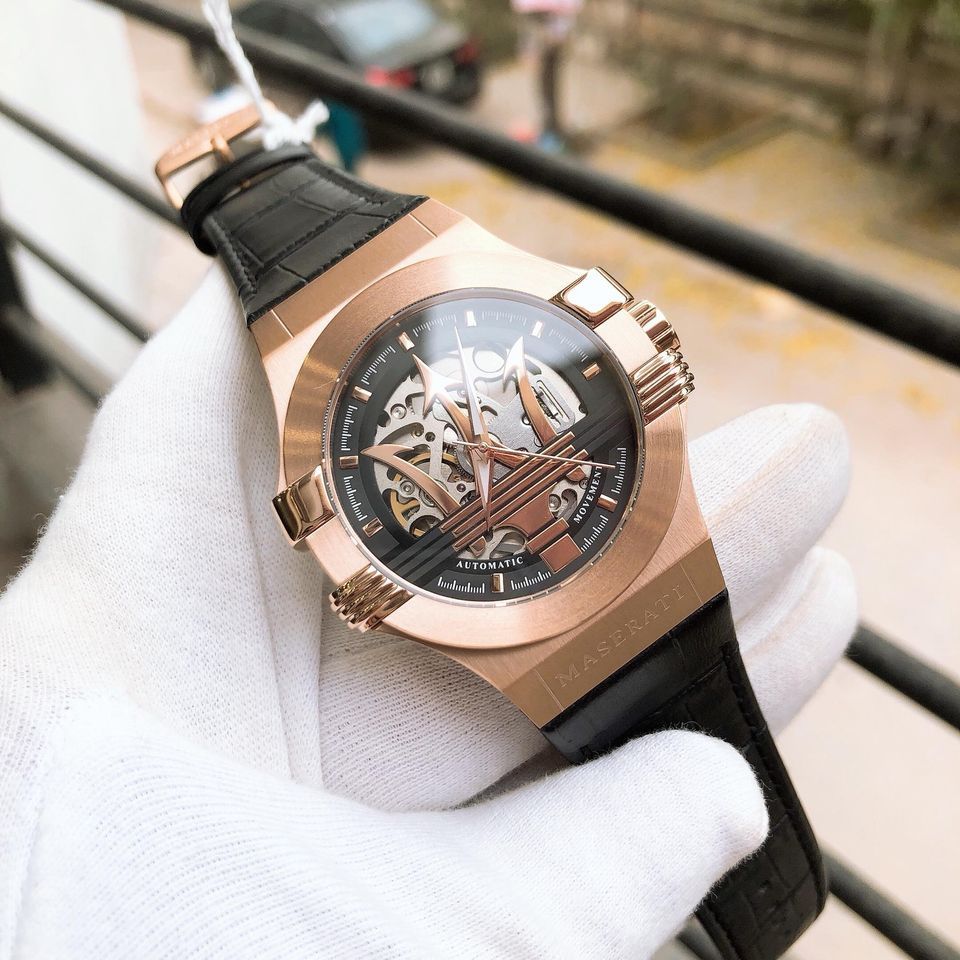 Maserati Potenza rose gold watch worn on wrist with black crocodile-textured strap