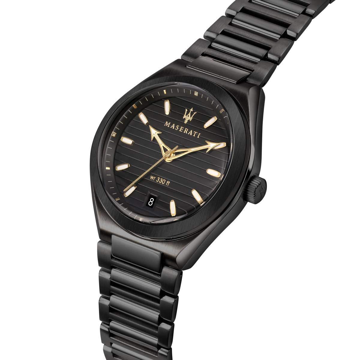 Angled view of Maserati black dial watch with gold hands and indices