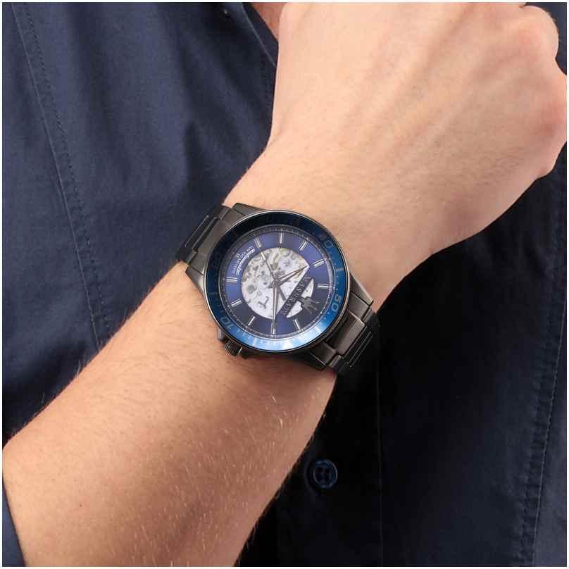 Maserati Sfida automatic watch worn on wrist with blue dial and steel bracelet