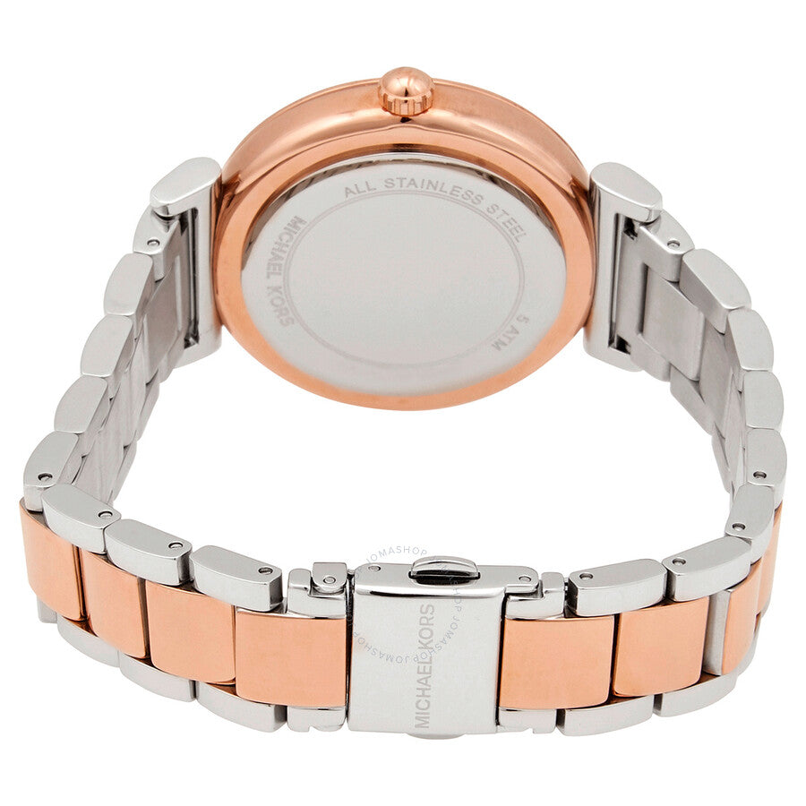Caseback view of Michael Kors Abbey watch showing rose gold case back and two-tone stainless steel bracelet