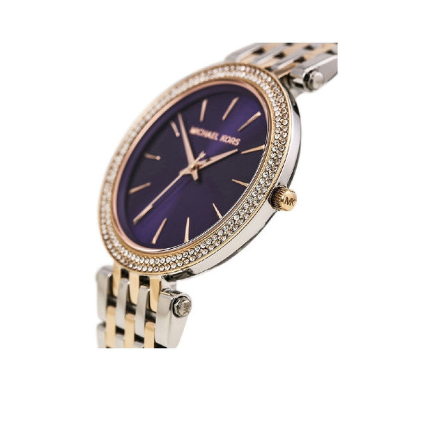 Michael Kors Darci watch angled view showing purple dial and two-tone bracelet