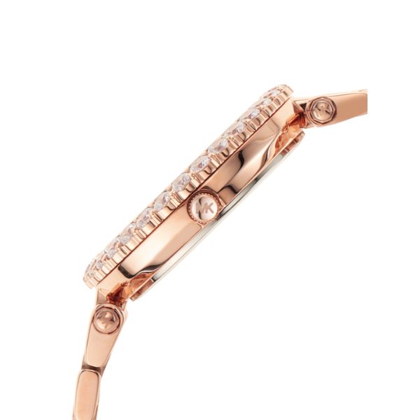Side profile of Michael Kors Darci watch showing rose gold case and bezel design