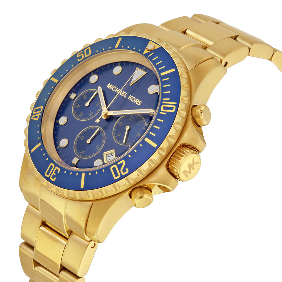 Three-quarter view of Michael Kors Everest watch showing gold-tone steel bracelet and navy bezel with chronograph subdials