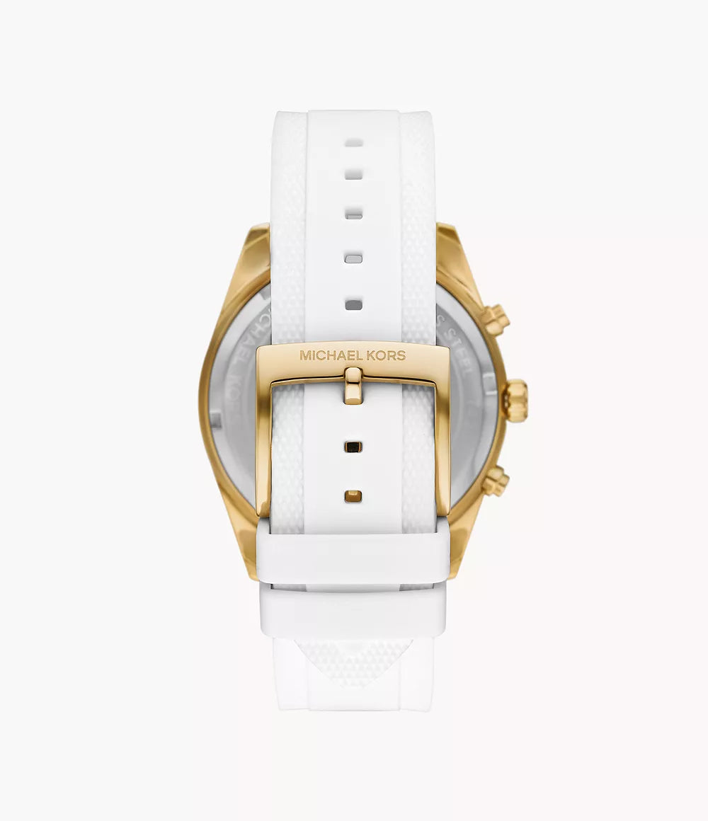 Caseback view of Michael Kors Hadyn MK7484 with white silicone strap and gold-tone buckle