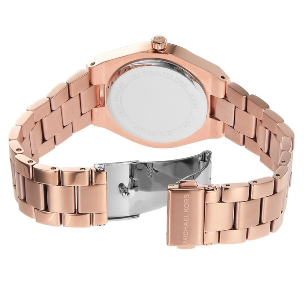 Rose gold watch displayed with caseback visible and metal bracelet strap