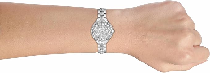 Michael Kors Slim Runway pavé silver-tone watch on woman's wrist