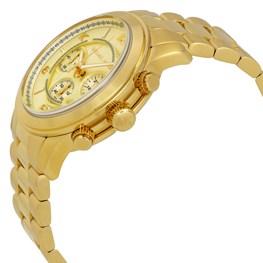 Michael Kors Runway Chronograph side profile showing gold-tone case, bracelet, and chronograph pushers