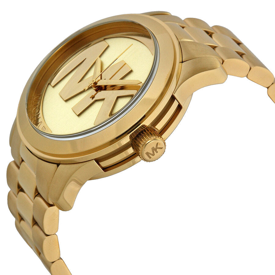 Michael Kors Runway gold-tone watch angled view showing case side and champagne dial