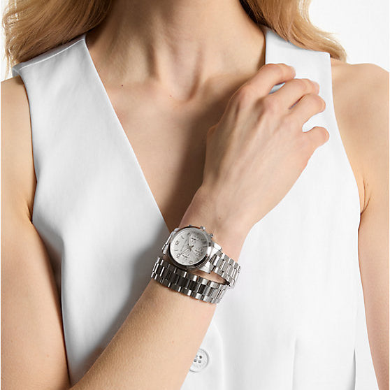 Michael Kors Runway chronograph watch worn on wrist with silver bracelet
