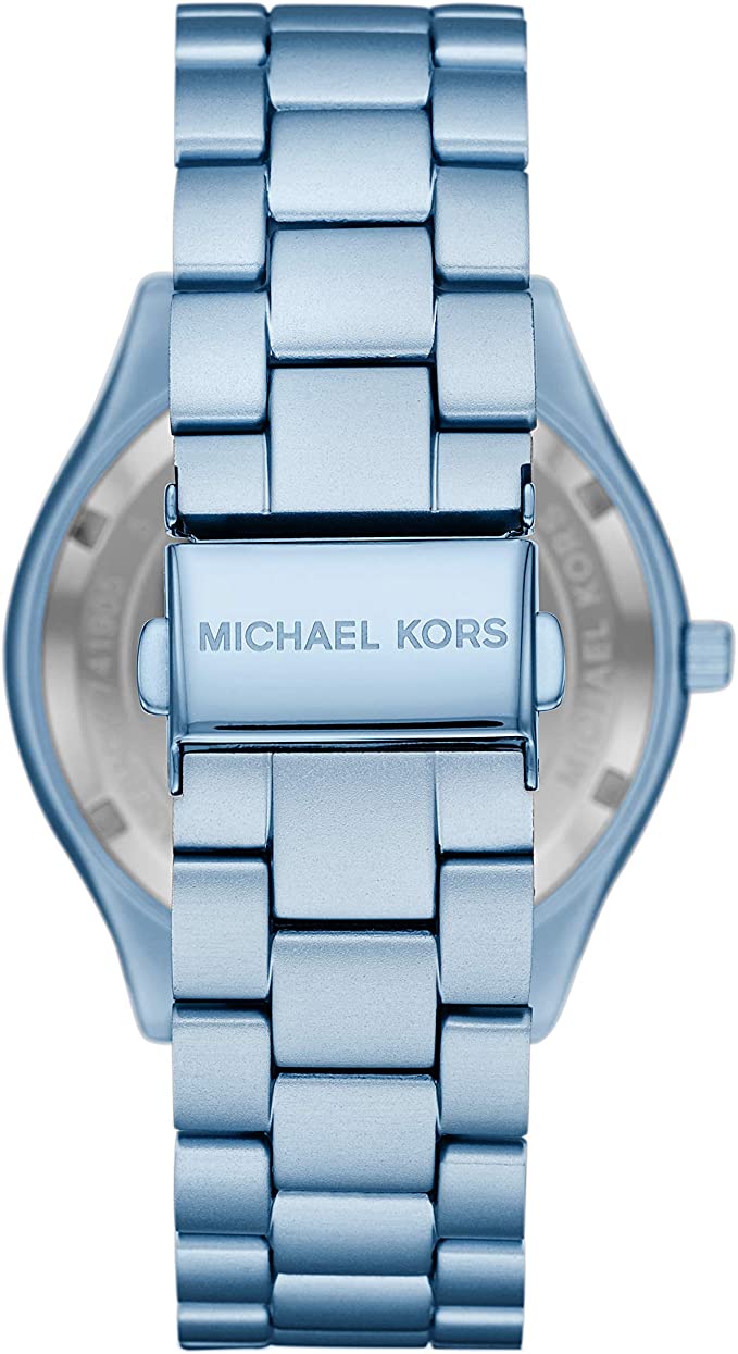 Caseback view of Michael Kors Slim Runway watch with engraved Michael Kors branding and blue bracelet