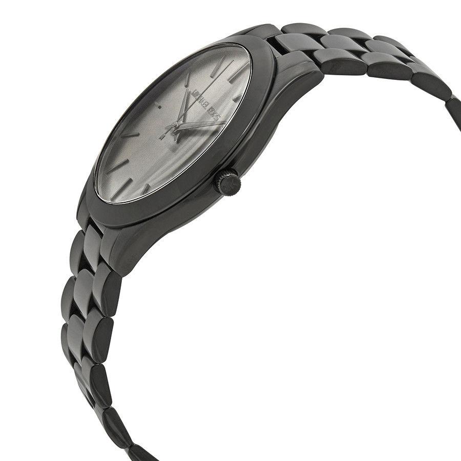 Side angle view of Michael Kors Slim Runway watch showing profile and case