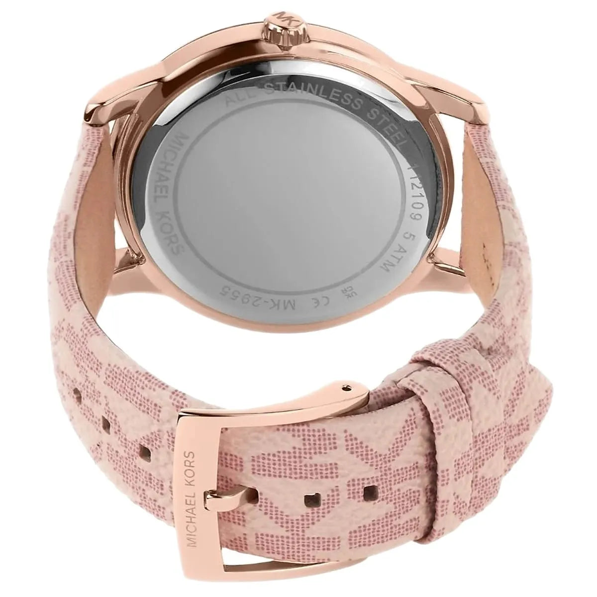 Caseback of Michael Kors Tibby watch showing stainless steel case with engraved text