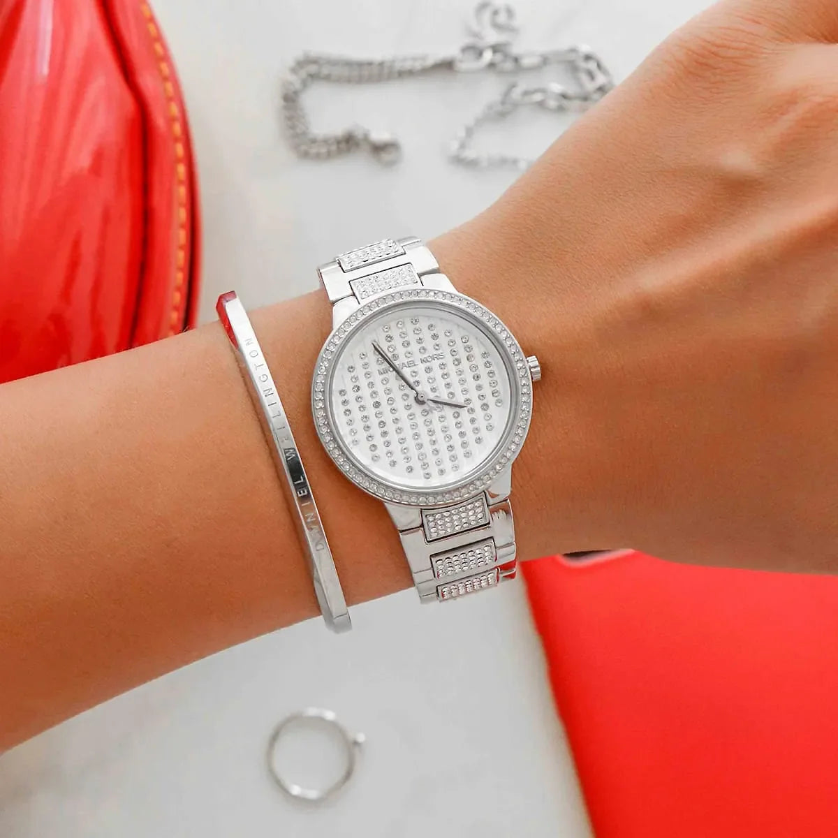 Michael Kors Gabbi Glitz silver watch worn on wrist with matching bracelet