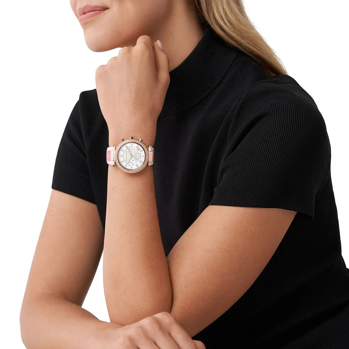 Michael Kors Parker chronograph watch worn on wrist, white dial with rose gold case visible