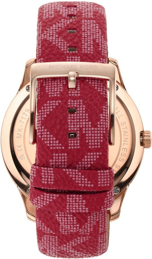 Michael Kors MK7179 caseback view showing red patterned canvas strap and rose-gold lugs