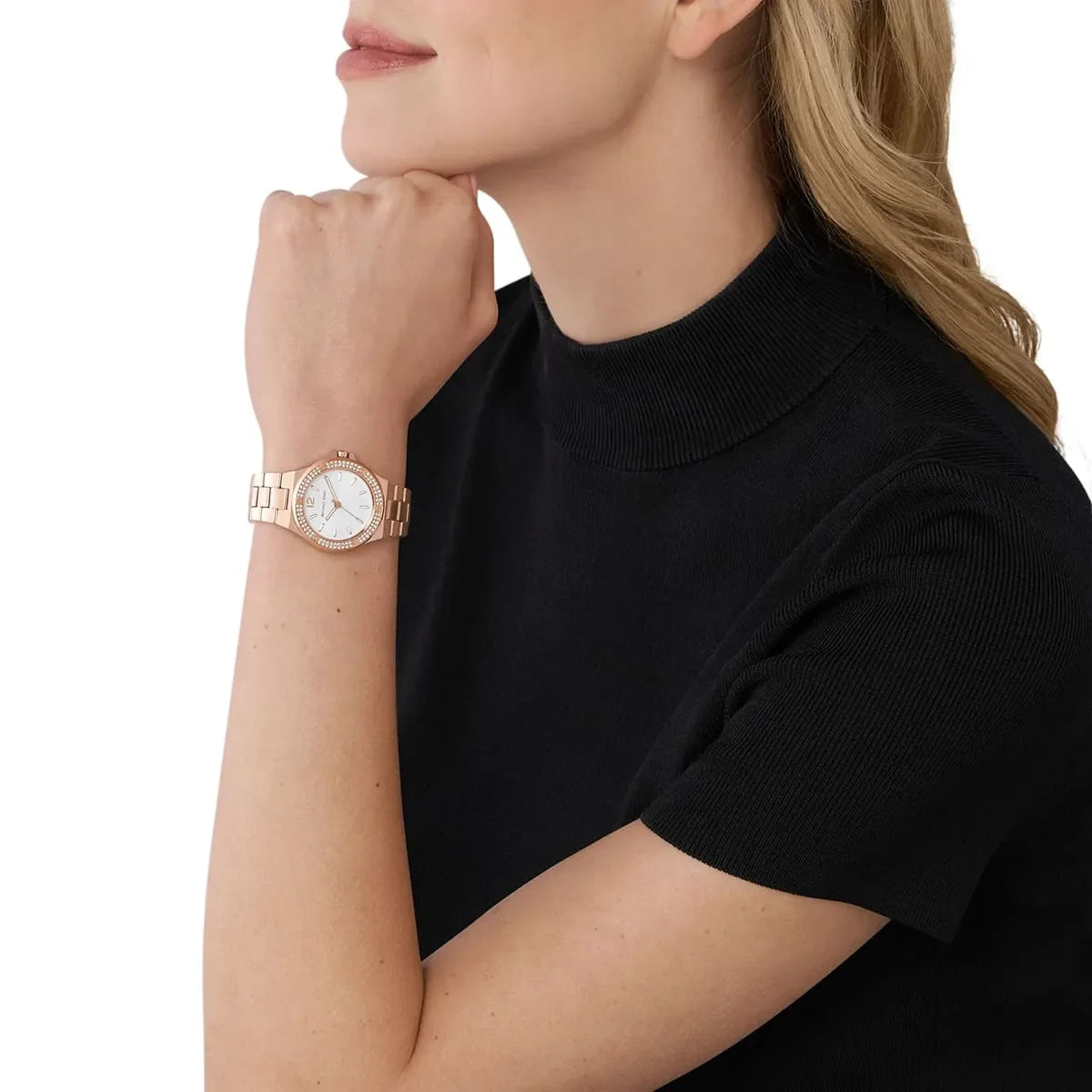 Michael Kors Mini-Lennox rose gold watch worn on woman's wrist