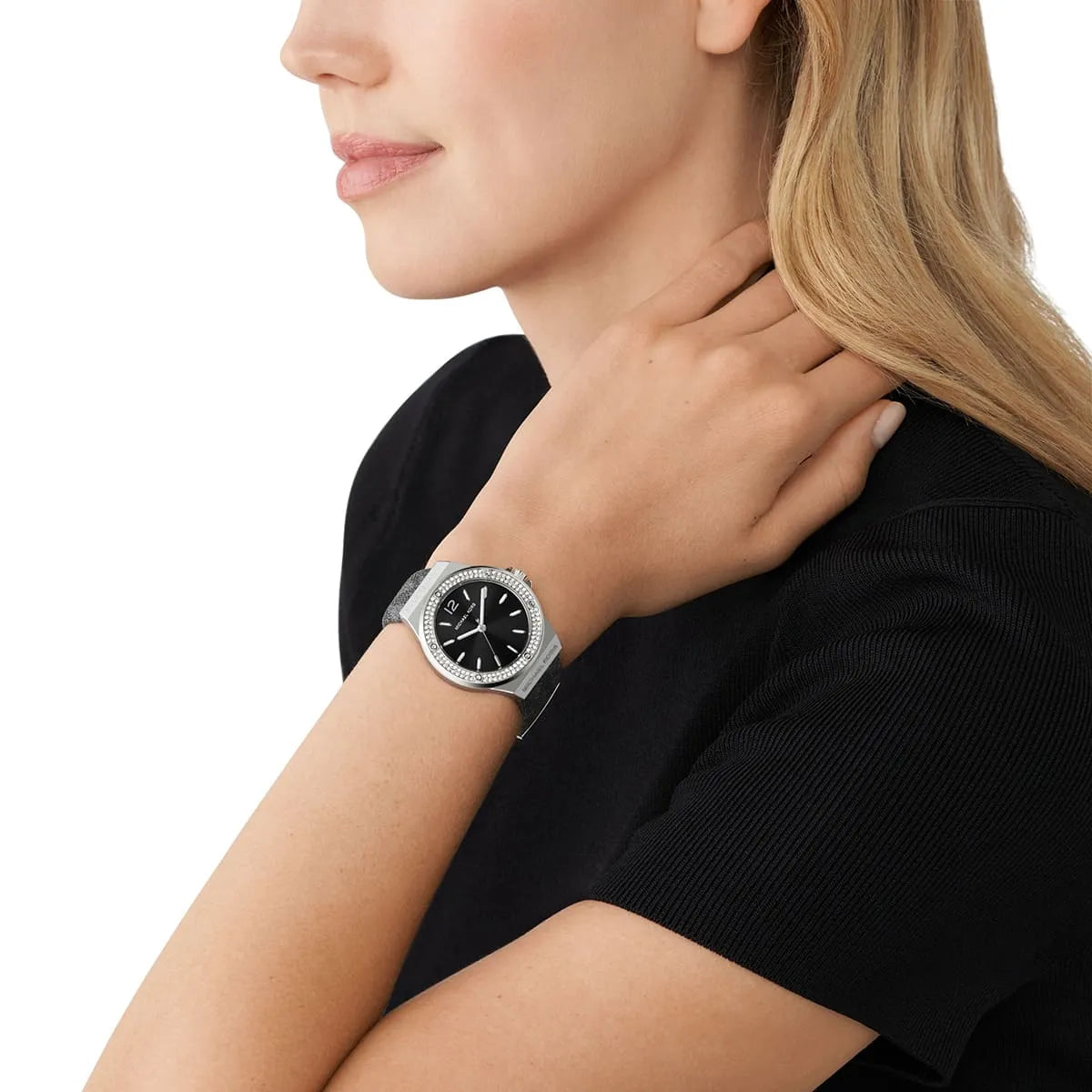 Michael Kors Lennox watch worn on wrist showing fit and black dial with leather strap