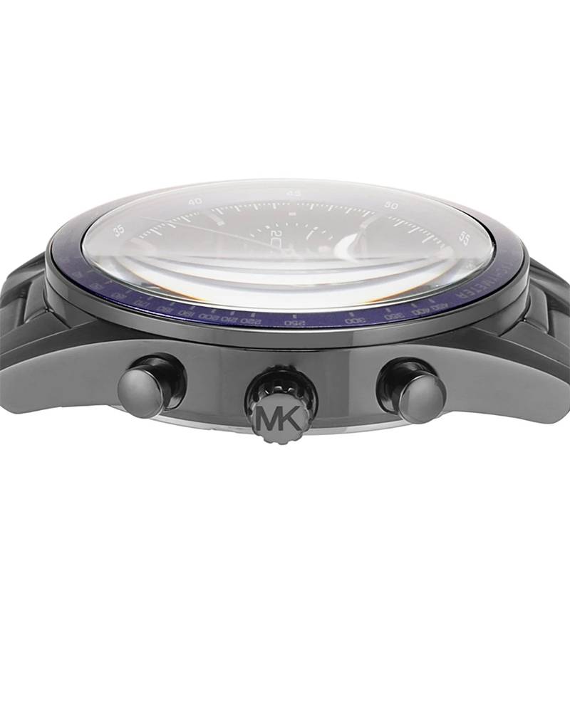 Side view of MK9111 watch showing gunmetal case, blue bezel, and chronograph pushers