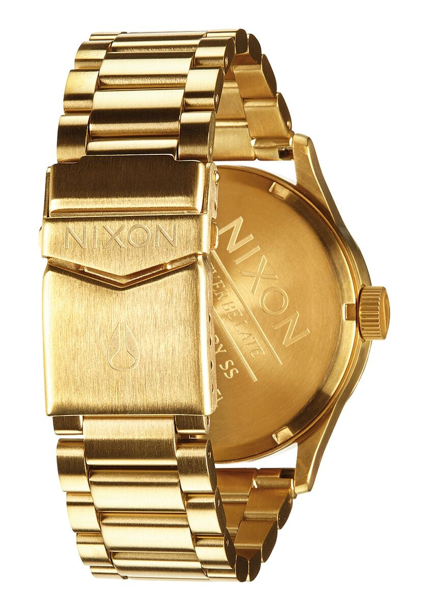 Nixon Sentry A356-502 watch case side profile showing gold-tone stainless steel construction