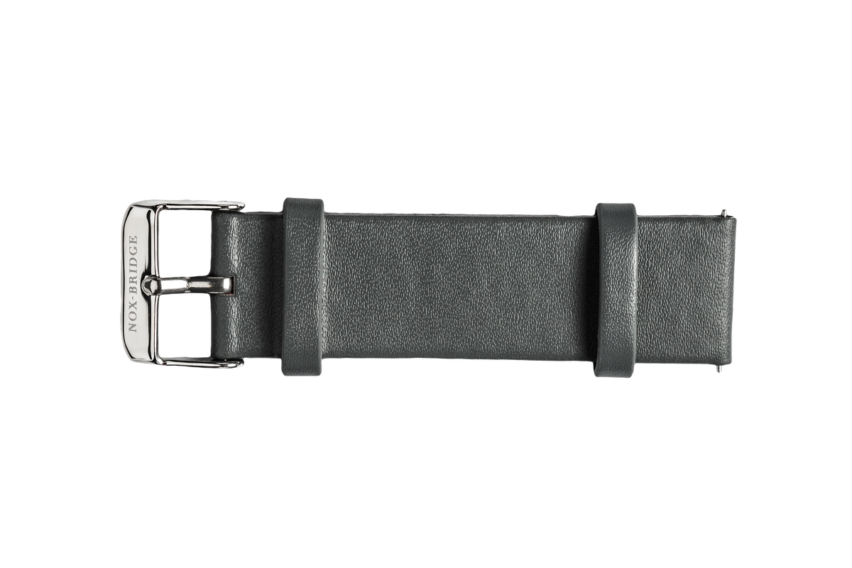 Grey vegan leather watch strap with metal buckle and adjustment holes