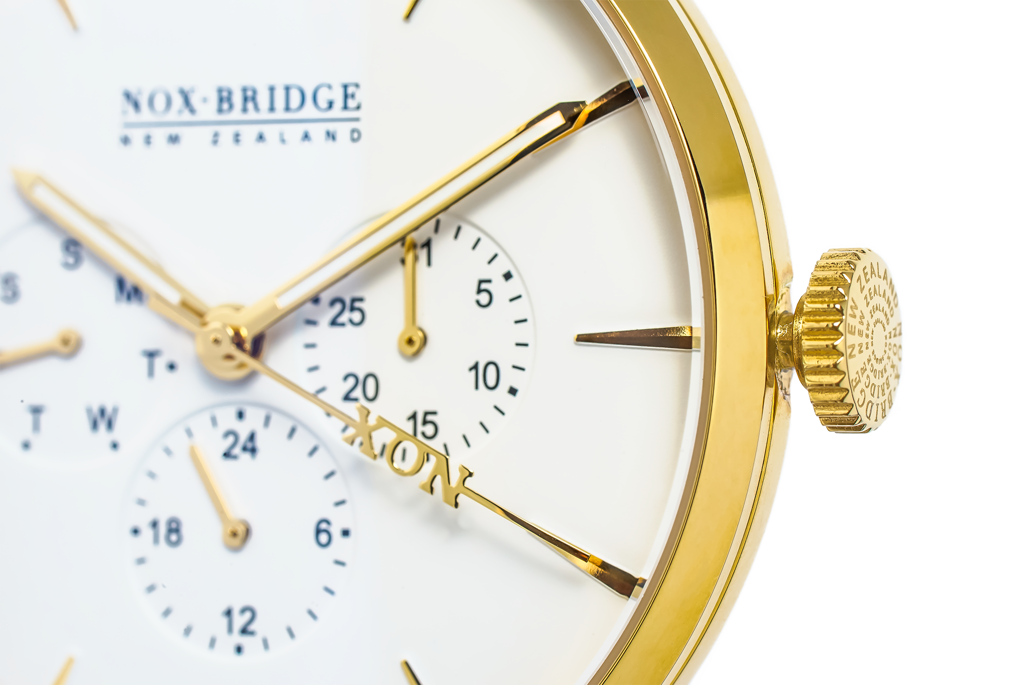 Close-up detail of Noxbridge Capella dial showing chronograph subdials and gold hands