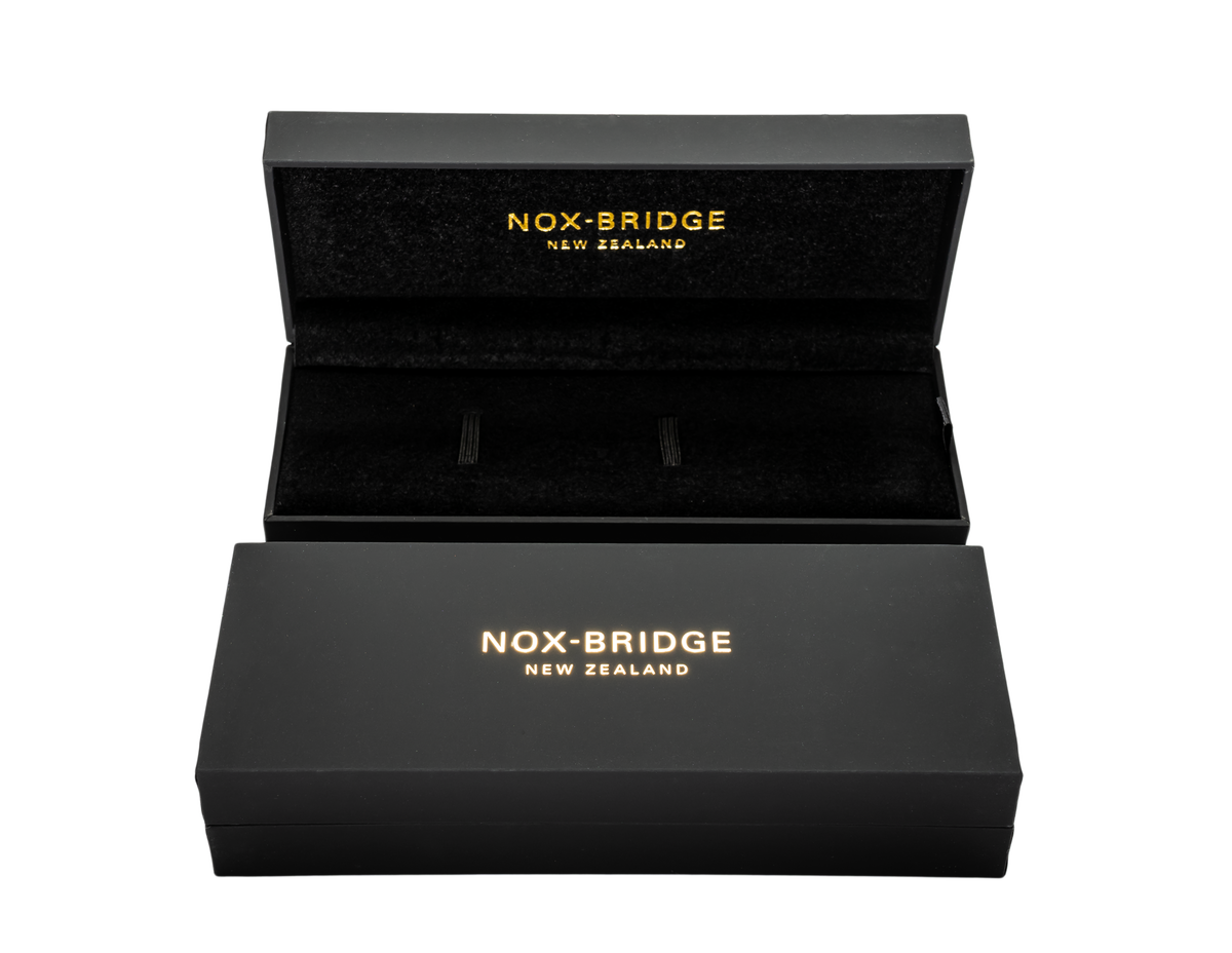 Noxbridge ECC40TT presentation box with black exterior and gold branding