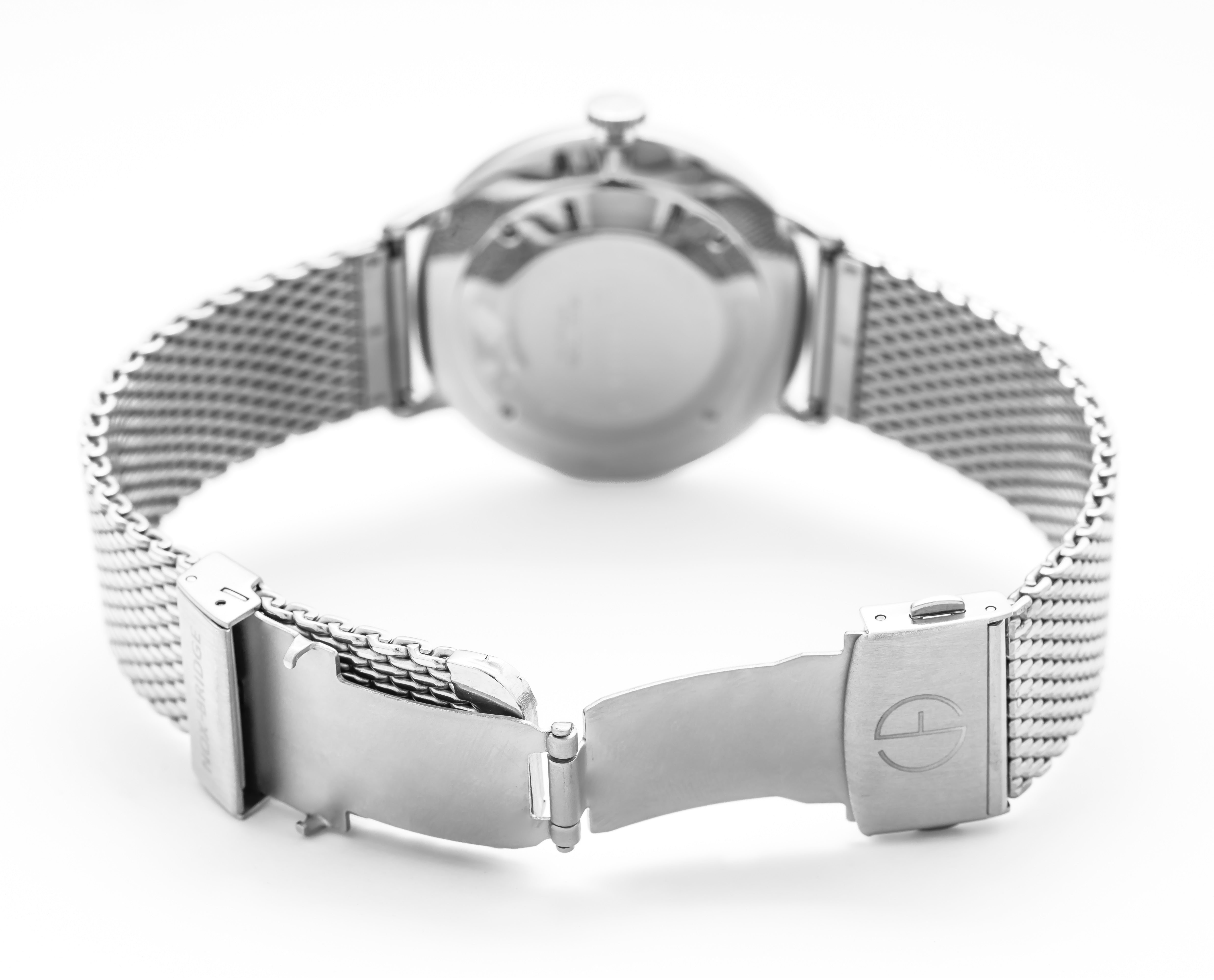 Noxbridge Pegasus mesh bracelet worn on wrist showing case and clasp detail