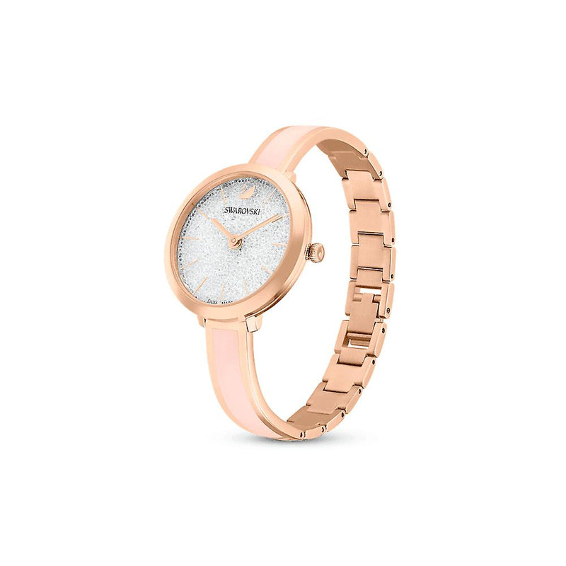 Swarovski Attract watch shown at angle with rose gold metal and pink bracelet
